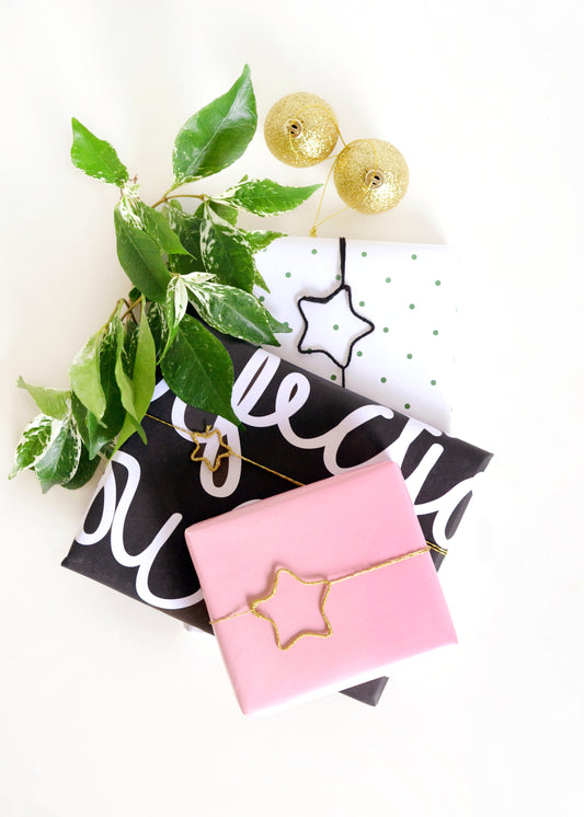 Yarn wrapped star gift toppers